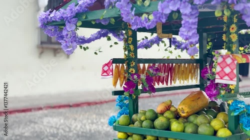 Antigua, Guatemala. March 17, 2025: colorful fruit cart on the cobblestone streets of the city.