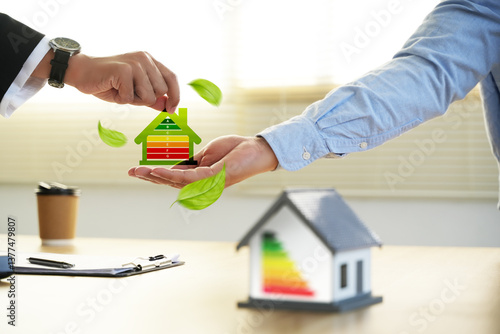 Energy-saving homes, energy efficiency concepts, eco-friendly home improvements, cost savings, low-energy eco-friendly homes, green handshake.