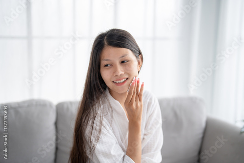 Free Download Daily beauty routine Asian woman.with clean skin uses micellar water to remove makeup - GFXLoad