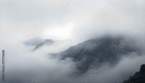 Misty Mountain Peaks Enveloped in Cloudscape, Dramatic View