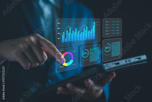 Analyzing Key Performance Indicators, Businessman using virtual screen to analyze key performance indicators KPI with various graphs and charts, showcasing data analysis and performance tracking