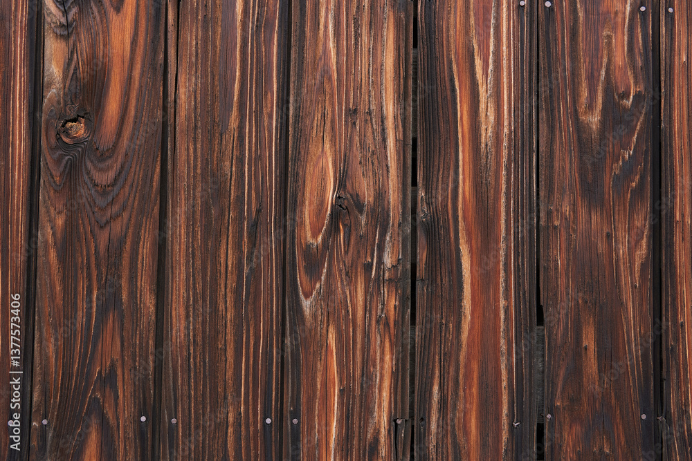 Obraz premium 焦げ目の美しい焼杉・日本の伝統的な外壁素材・背景テクスチャーシリーズ