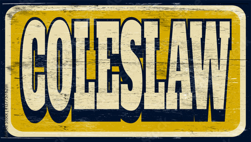 Aged and worn coleslaw sign on wood