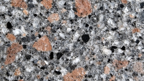 Close up of polished granite surface showcasing intricate patterns and textures in natural stone material