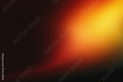 Abstract orange and red light leak on black background.