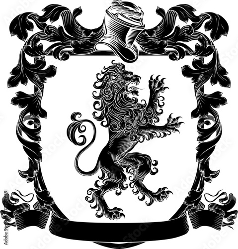 A lion coat of arms or crest family heraldry medieval heraldic knight shield with helmet and acanthus filigree scroll ornament in a vintage woodcut style.