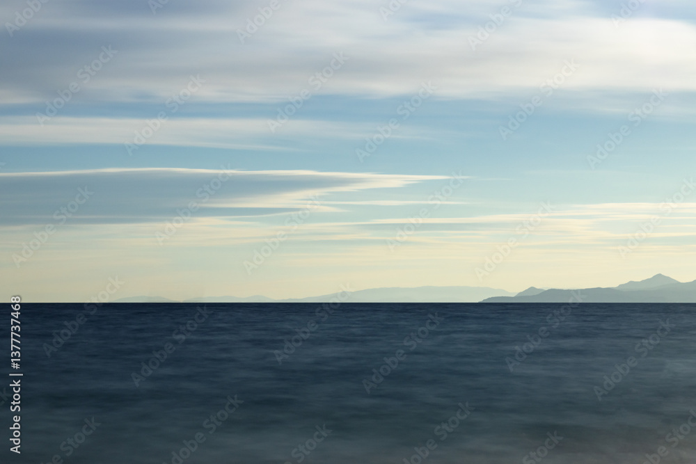 Aegean Sea. Quiet waves in the bay. A clear horizon Aegean Sea. Quiet waves in the bay. A clear horizon