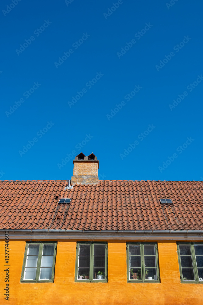 Classic Copenhagen homes in Nyboder, with bold colors and clean geometry, ideal for editorial or commercial stock needs highlighting Danish urban design. Classic Copenhagen homes in Nyboder, with bold colors and clean geometry, ideal for editorial or commercial stock needs highlighting Danish urban design.