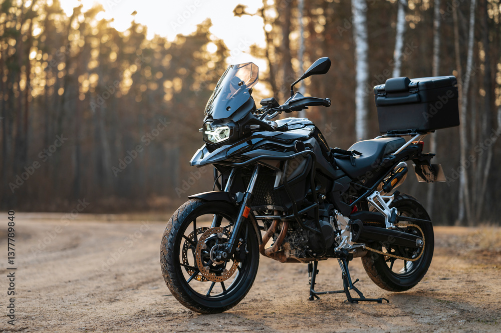 Obraz premium black adventure style motorcycle captured outdoors