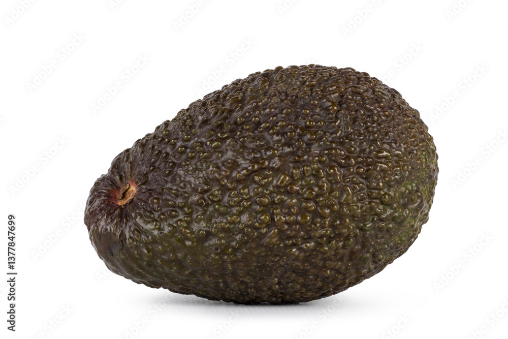 Avocado laying side ways. Isolated on a white background Avocado laying side ways. Isolated on a white background