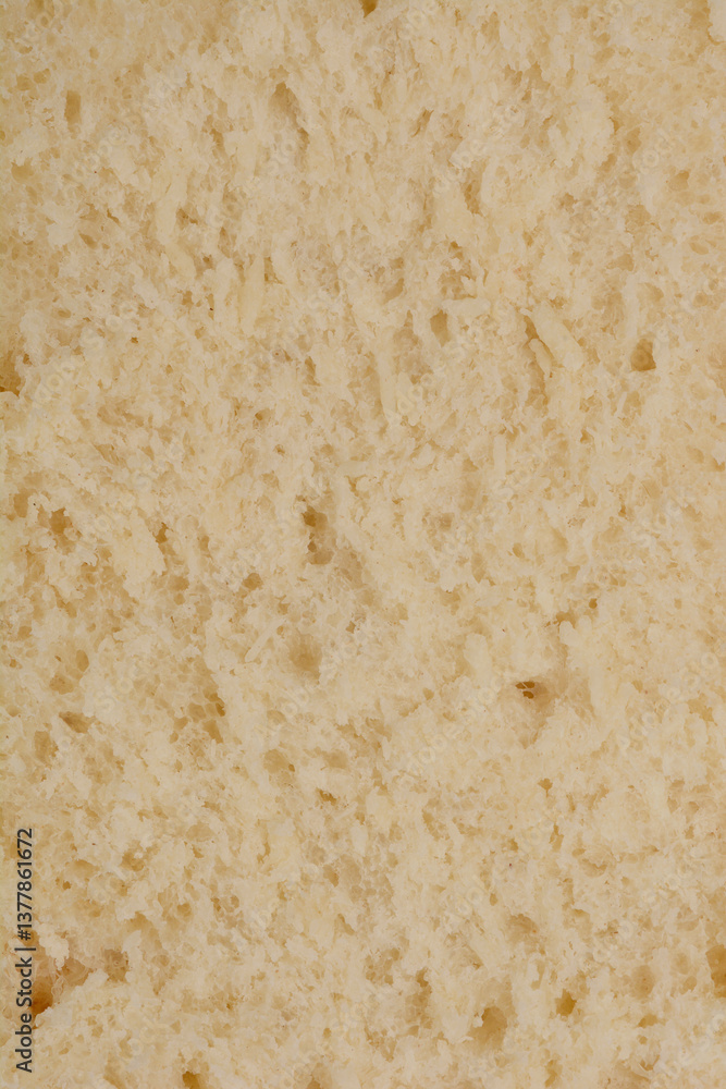 A close-up, macro shot of the interior texture of a bread, showcasing its porous, airy crumb and light color A close-up, macro shot of the interior texture of a bread, showcasing its porous, airy crumb and light color