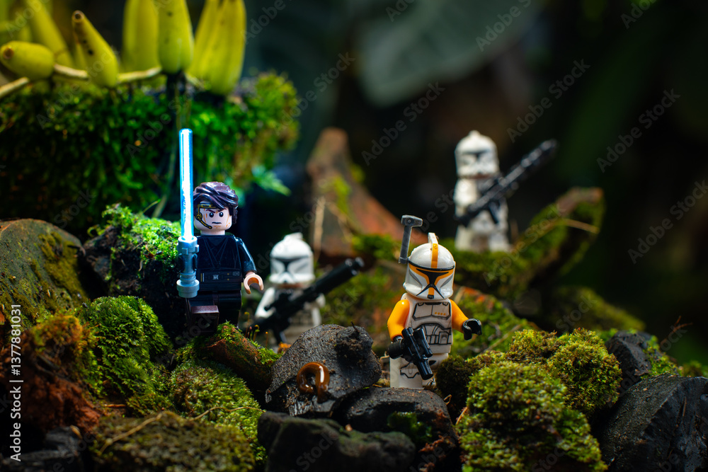 Naklejka premium Depok, Indonesia - April 1, 2025: Lego toys photography, Anakin Skywalker leads 1st phase clone troopers in dark forest covered with moss, with bokeh background