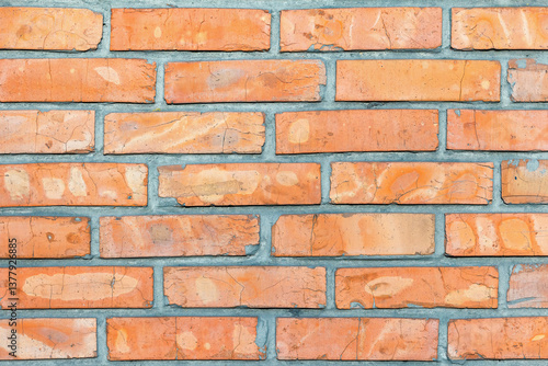Obraz na płótnie Exquisite patterns of rustic orange bricks enhance the charm of a timeless wall decor w salonie