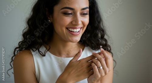 Woman examining diamond ring