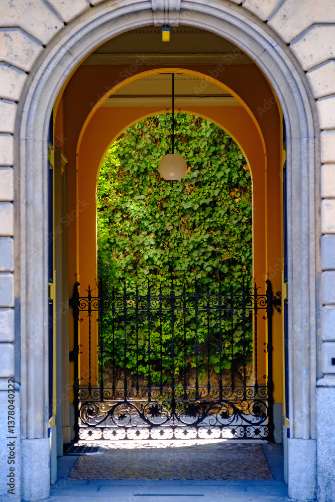 Entyway of historic residential palace in Piazza Castello, Milan, Italy