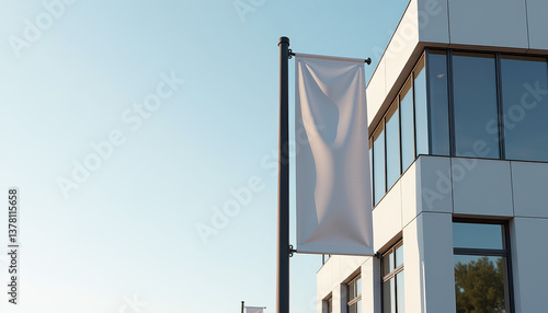 Wallpaper Mural Flag banner mockup. Vertical flag banner mockup hanging on black pole with blank white fabric against modern building facade and clear blue sky background. Torontodigital.ca