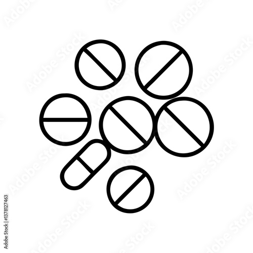 Medicines and pills arranged on a white surface