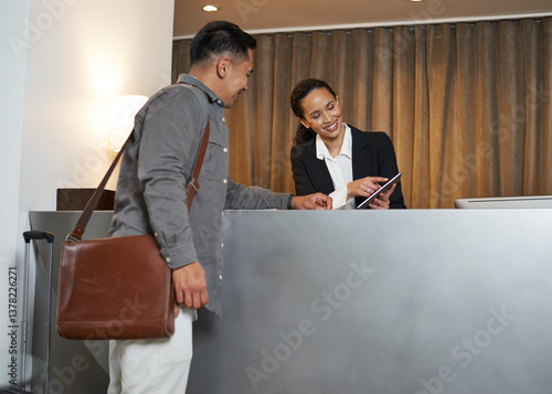 Obraz na plátně Receptionist Assisting Traveler in Hotel Lobby During a Business Trip