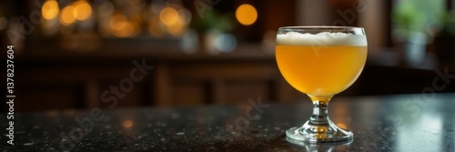 Elegant female yellow cocktail with white foam on dark table, drinks, elegant