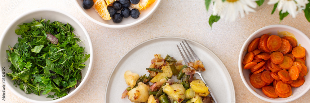 Stewed duck fillet with potatoes and asparagus and radishes, mixed salad of various greens, baked carrots in tahini sauce