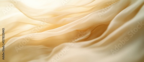 Gentle, flowing sheer fabric in soft cream hues creates an ethereal, dream-like atmosphere with its delicate waves.