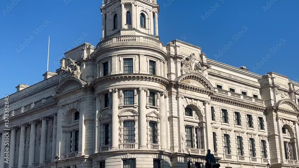 Elegant Baroque style government buildings in central London, gleaming under a crisp blue sky on a sunny day Elegant Baroque style government buildings in central London, gleaming under a crisp blue sky on a sunny day