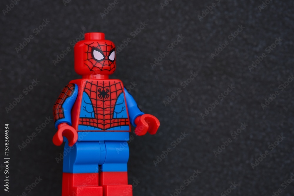 Naklejka premium Tambov, Russian Federation - March 18, 2025 Lego Spider-Man minifigure against a black background