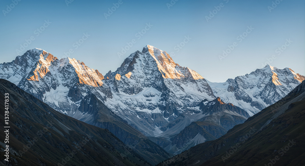Obraz premium Majestic mountains glow at dawn in stunning natural landscape