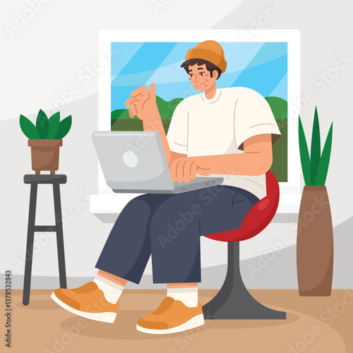 A creative worker operates a laptop in a workspace