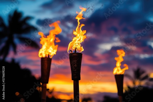 Hawaii luau party in Maui with fire tiki torches burning at sunset, tropical island celebration, vibrant evening atmosphere, festive beach scene, tropical summer vibes. AI generated illustration.