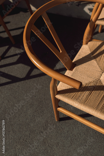 Wooden Chair with Shadows in Sunlight