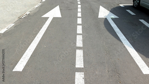 Wallpaper Mural Road markings indicate direction on urban street Torontodigital.ca