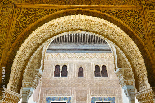 Arabic interior of Nasrid Palace of Alhambra complex in Granada, Andalusia, Spain. Elaborately carved interiors and ornaments. 