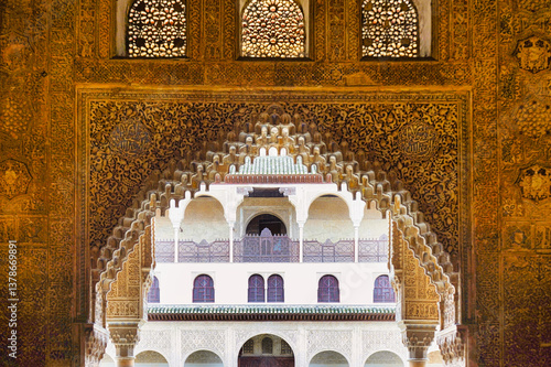 Arabic interior of Nasrid Palace of Alhambra complex in Granada, Andalusia, Spain. Elaborately carved interiors and ornaments. 