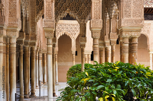 Arabic interior of Nasrid Palace of Alhambra complex in Granada, Andalusia, Spain. Elaborately carved interiors and ornaments. 
