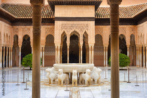 Arabic interior of Nasrid Palace of Alhambra complex in Granada, Andalusia, Spain. Elaborately carved interiors and ornaments. 