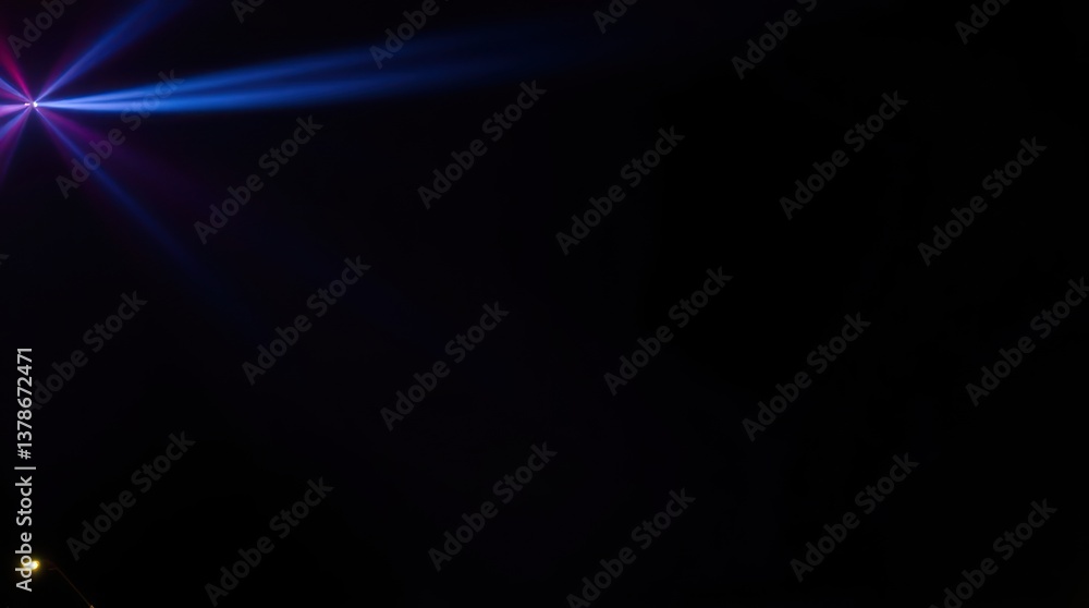 Fototapeta premium Abstract Light Beams Radiating in the Dark Night Sky Event