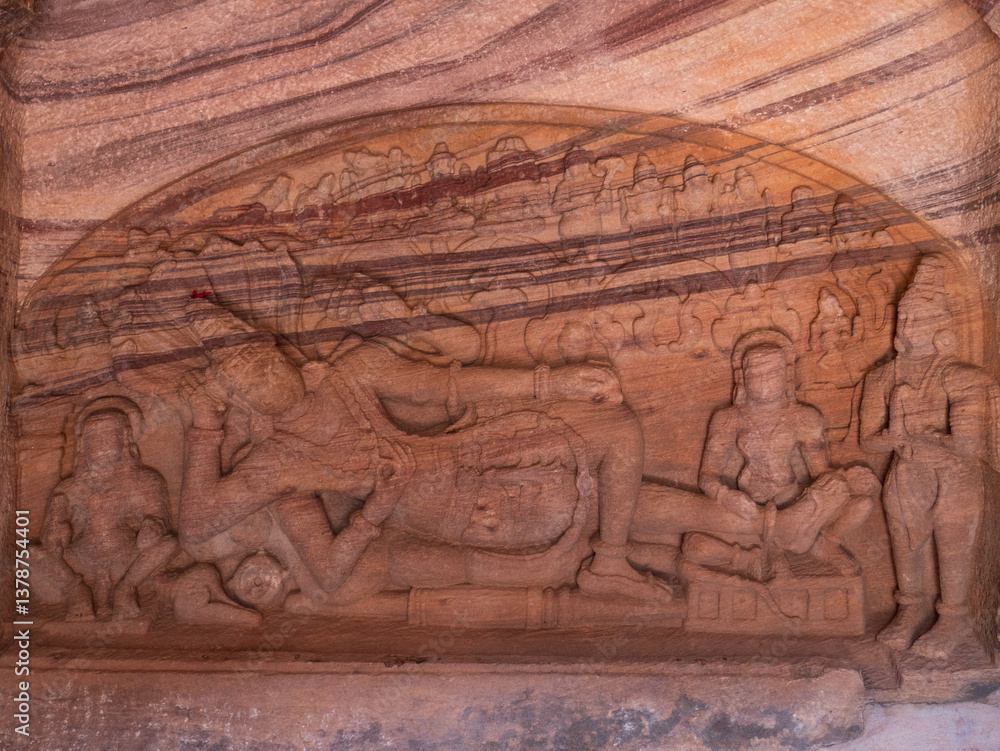 Amazing rock carving and sculptures at Badami ancient hindu temple complex, tourist destination in Karnataka, India