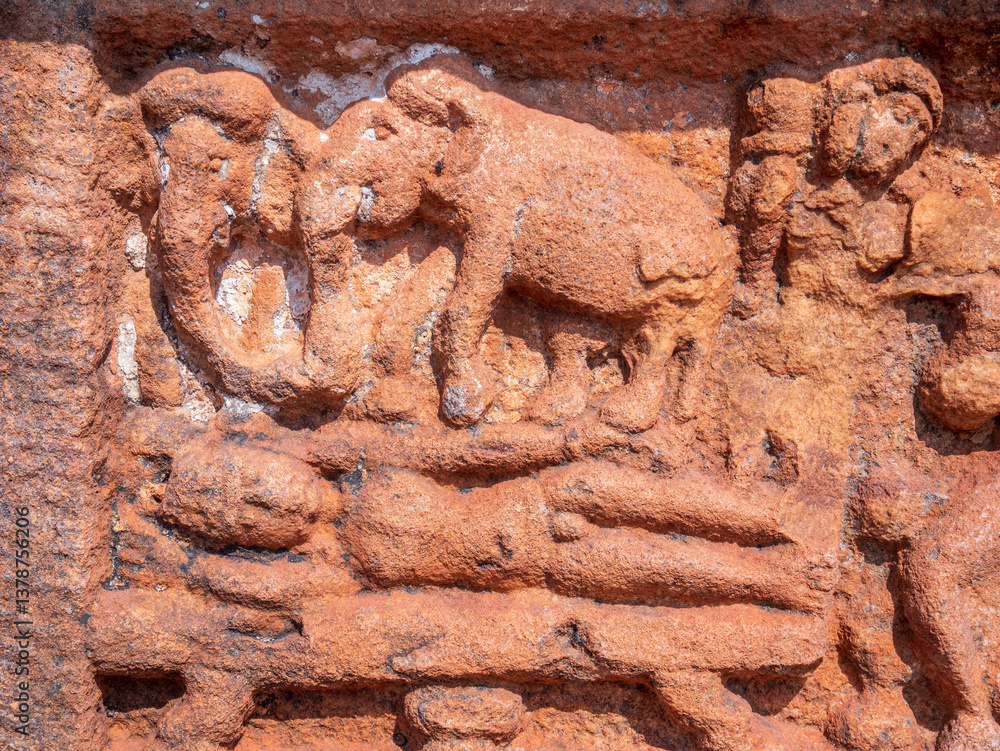 Amazing rock carving and sculptures at Badami ancient hindu temple complex, tourist destination in Karnataka, India