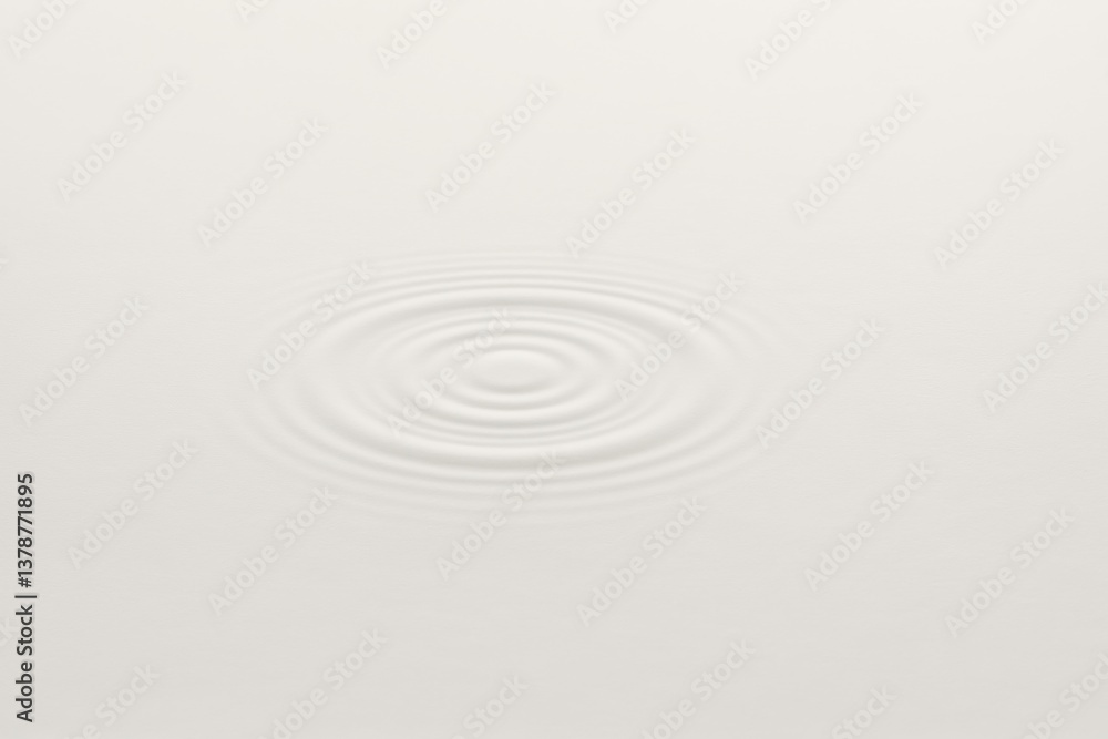 Obraz premium Concentric ripples expanding on the surface of a pristine white liquid create a mesmerizing and calming pattern, evoking feelings of tranquility and purity in a minimalist design