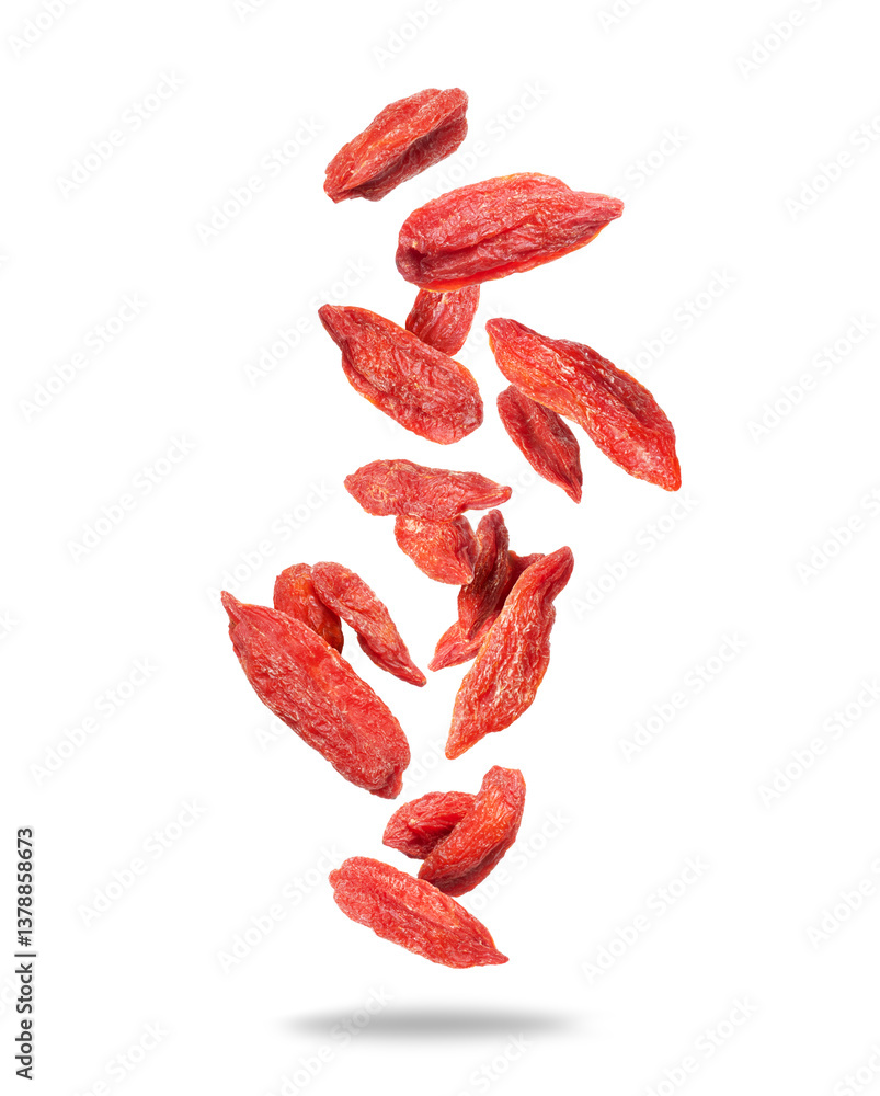 Dried goji berries in the air close up isolated on white background Dried goji berries in the air close up isolated on white background