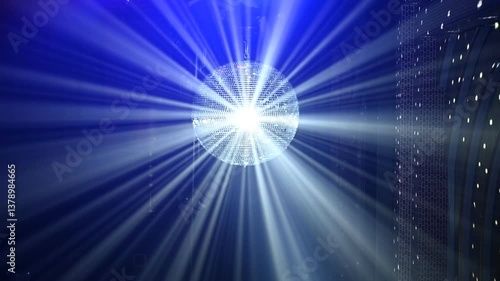 A mirrored disco ball reflects light rays throughout the room. Smoke enhances the visibility