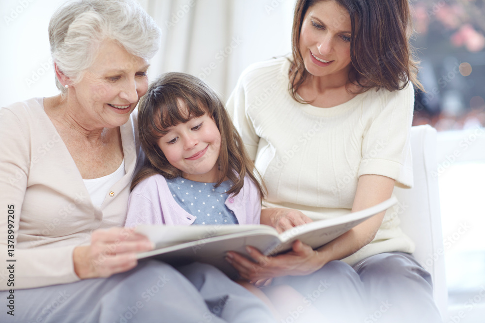 Reading, story and kid with mom and grandmother on sofa in living room for bonding together. Happy, relax and girl with mother and senior woman enjoying fantasy book, novel or literature at home. Reading, story and kid with mom and grandmother on sofa in living room for bonding together. Happy, relax and girl with mother and senior woman enjoying fantasy book, novel or literature at home.
