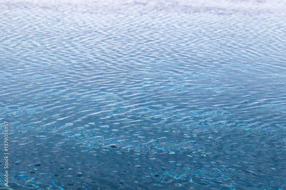 Obraz premium Tranquil image of a calm water surface with delicate ripples