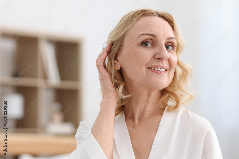 Portrait of smiling middle aged woman at home. Space for text Portrait of smiling middle aged woman at home. Space for text