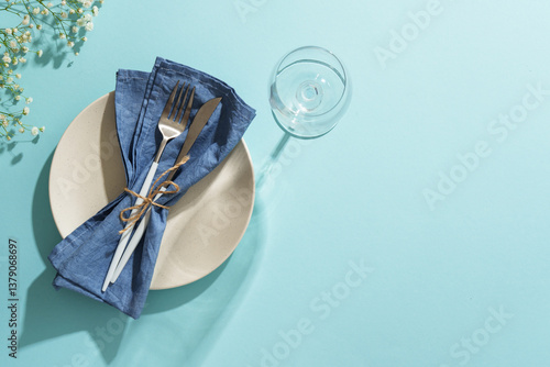 Obraz na płótnie Spring table setting on blue with hard shadows in sunny day. w salonie