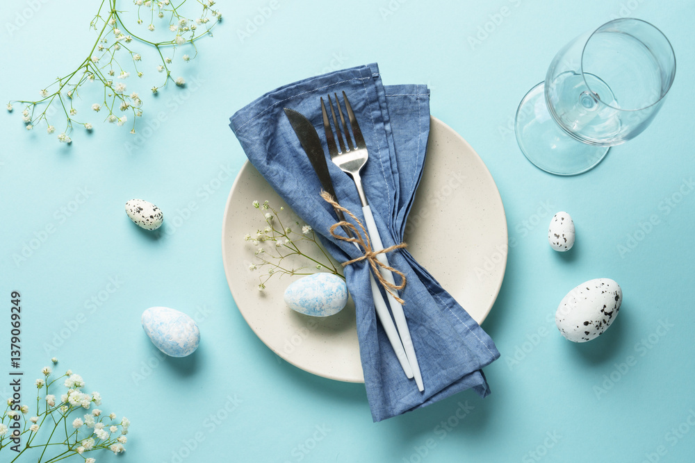 Easter table setting on blue.