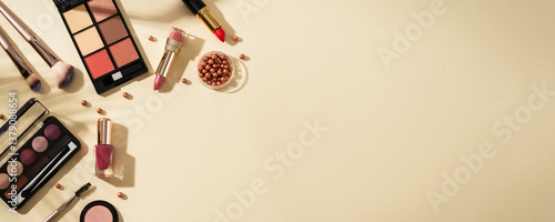 Obraz na płótnie Make up products at colored background with hard shadows. w salonie