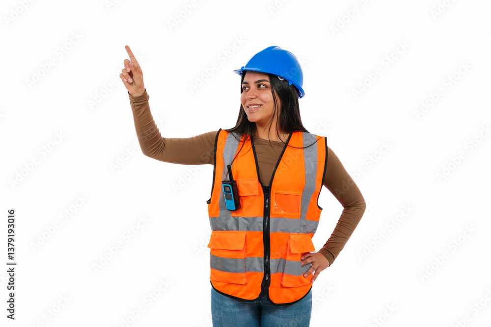 Latina construction worker pointing up with index finger Latina construction worker pointing up with index finger