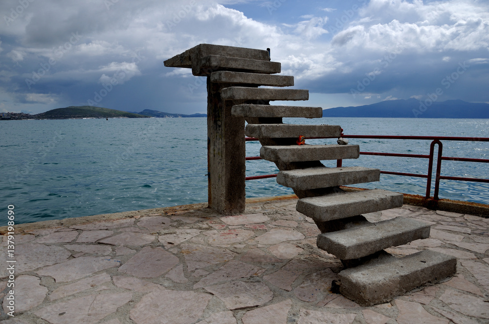 Obraz premium Abandoned Steps Leading Nowhere on the Coast of Sarandë, Albania